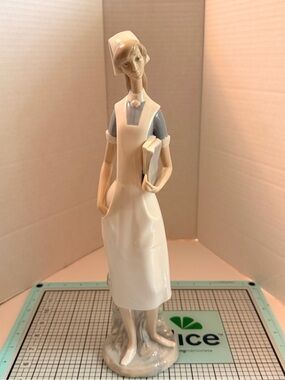 Lladro Porcelain Figurine Nurse in White and Light Blue